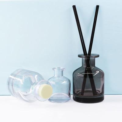 China 50ml 100ml 150ml Cosmetic Empty Black Round Glass Aromatherapy Tubular Perfume Glass Diffuser Bottle With Cap for sale