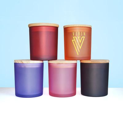 China Custom Silk Screen Printing Logo Luxury Glass Candle Container Home Decoration Logo Candle Jar With Lid for sale