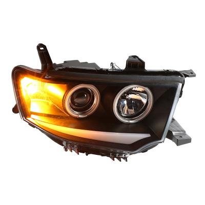 China It is suitable for Pajero sports headlight assembly in headlight flame angel eye LED lamp double lens Pajero sports light for sale