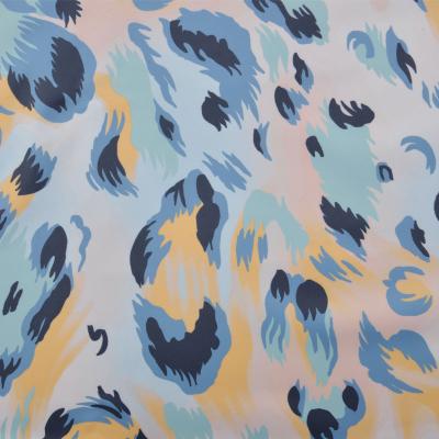 China Waterproof design and color leopard print fabric abstract polyester fabric for sublimation printing fabric for women dress for sale