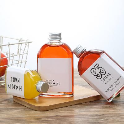 China 250ml 350ml Clear Bottle Hot Flat Tea Milk Tea Infusion Glass Cold Brew Coffee Juice Bottle For Whiskey for sale