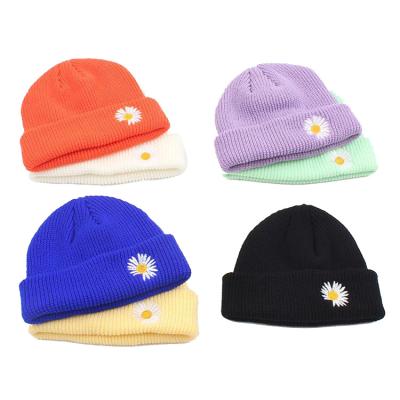 China 2020 fashion Little daisy embroidered winter hat solid color pink knitted embroidered beanie for girl for sale