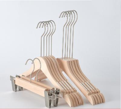 China Manufacture fashion wooden hangers traditional long neck hook hangers for brand store for sale