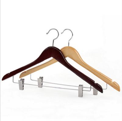 China Eco-Friendly Wholesale Set Natural Wood Clothes Pants Hangers With Skirt Clips for sale