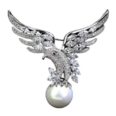 China Luxury Women Eagle Brooch Crystal Swan Brooch Luxury Fashion White Rhinestone Animal Pearl Brooch Pin for sale