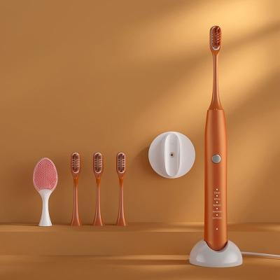 China Twice a Day Adults Electric Toothbrush Replaceable Heads Portable Smart Vibration Waterproof Rechargeable Deep Cleaning Custom for sale