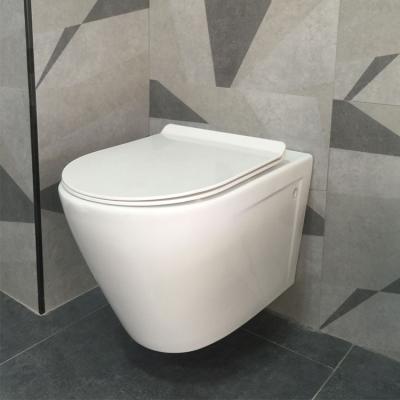 China Cheap Ceramic Concealed Cistern Wall Hung Toilet Bowl Wall Mounted One Piece Soft Toilet Seat Cover European Wc Toilet for sale