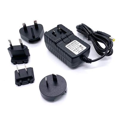 China Powered By 12V2A 24V1A 9V2A 5V3A US Au Eu UK DC Adapter With Plugs Interchangeable Power Fit for sale