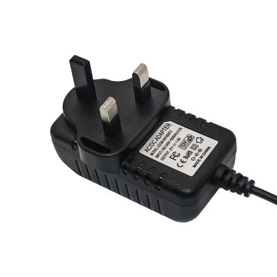 China Plug Into British Socket DC9V0.5A1A 9W Mini Electronic Organ Guitar Speaker Power Supply Adapter for sale