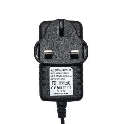 China Powered By 12V1A 12W Motor Massager Walkie Talkie Router Power Supply Remote Control Adapter for sale