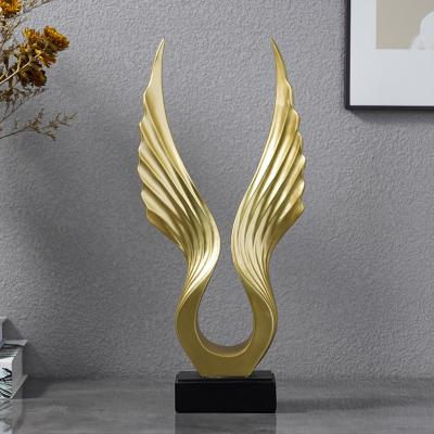 China Hot Sale Factory Price Modern Home Decoration Accessories Gold Wing Shapes Desk Ornaments For Home Decoration TV Porch Decoration for sale