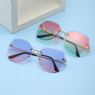 China 2022 New Rimless Sun Glasses De Sol Custom Logo Oversized Square Sunglasses Women Fashion Sunglasses Design Polygon Frameless Shades for sale