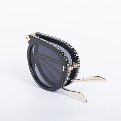 China Fashion Sunglasses 2021 New Diamond Sunglasses Women Shape Luxury Folding Sunglasses for sale