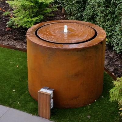 Chine Le métal de jardin ornemente la caractéristique ronde en acier de nappe phréatique de Corten de fontaine à vendre