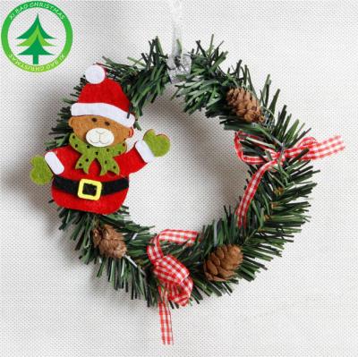 China Promotion Christmas Gift Hg Garland Decorate Christmas Decorations Circle Snowman Santa Claus Floral PVC Garland Decoration for sale