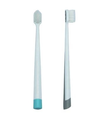 China Manual dense tufts taped stiffens adult toothbrush for sale