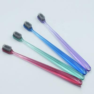 China Japan Adult Toothbrush Manual Small Handle Transparent Head for sale