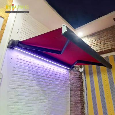 China Retractable Full Cassette Electric Awning With Remote Control LED Light for sale