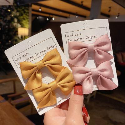 China Cute soft fashion fabric bows for girls red hair bow hair accessories for kids hair cut 2021 for sale