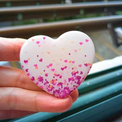 China Wholesale Customized Factory Design Universal Folding Heart Shape Cell Phone Portable Stand Plastic Adjustable for sale