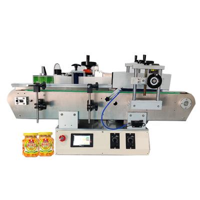 China Factory Packing Products Pouch Tabletop Small Baby Food Labeler Honey Bottle Roll By Labeling Machine for sale