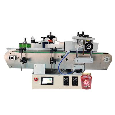 China Commodity Table Top Semi-automatic Tamp Labeling Machine Round Bottle Semi-automatic Labeling Machine With Logo for sale