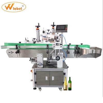 China 2021 food most accurate three roll wrap round bottle automatic positioning labeling machine with code function for sale