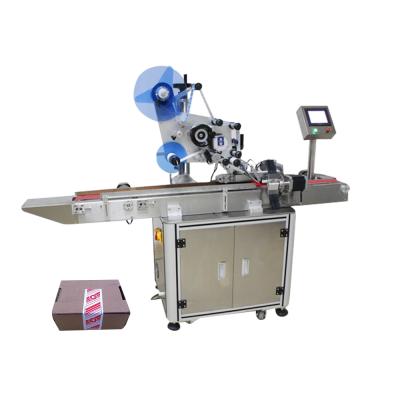 China Automatic Corner Top Flat Side Carton Commodity Chain Labeling Machine For Packaging Face Mask Box Seal for sale