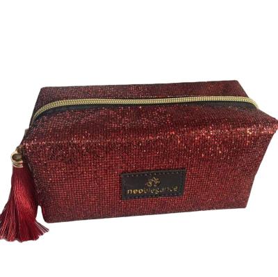 China Tassel Stock Glitter Glitter Zipper Beauty Brush Cosmetic Makeup Bag For Women Girl for sale