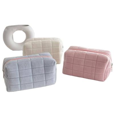 China New Custom Fashion Stock Logo Puff Quilted Soft Velvet Travel Beauty Makeup Pouch Zipper Toiletry Cosmetic Bag for sale