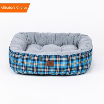 China Breathable Eco-Friendly Indoor Branded Kennel Shape Donut Cotton Flannel Small Pet Bed With Lenyard for sale