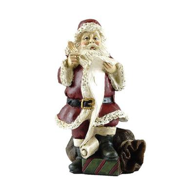 China Europe Customized Santa Shopping List Figurine Resin Opens Friend Children's Gift Cute Home Decoration for sale