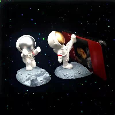 China Creative China Astronaut Series Figure Desktop Ornaments Phone Holder Resin Decoration Crafts for sale