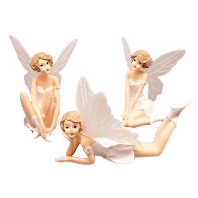 China Fairy Elf Angel Doll Girl Decoration Creative PVC Cake Decoration White Flower Girl Opens Car Home Accessories for sale