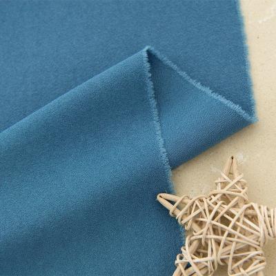 China Sustainable Hot Sale Plain Dyed 100% Viscous Foam Crepe Fabric For Pants for sale