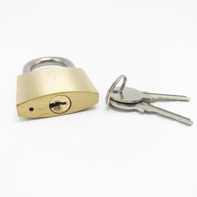 China Household Supply Sample Anti Cut Smooth Solid Brass Finish Master Key Copper Hardened Outdoor Padlock Evenly Locked for sale