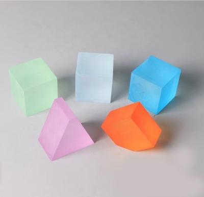 China Recycled Materials Stained Bright Color Crystal Blocks Matte Colored Triangle Block Cut To Size Cubes In Display for sale