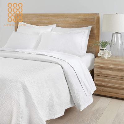 China Simple Wholesale Five Star Hotels Crinkle Textured Bed Sheet Polyester 100% White Corrugated Top Sheet for sale