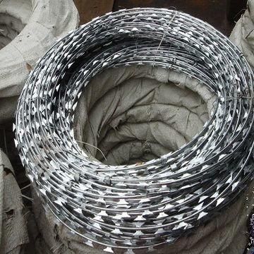 China Custom Single Coiled Razor Barbed Wire Mesh , Fake Razor Wire 900mm Diameter for sale