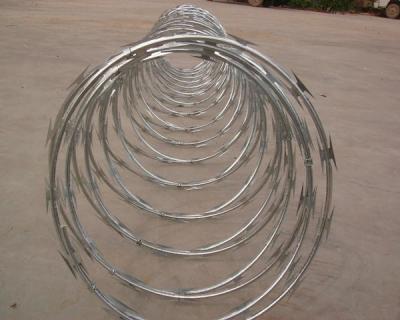 China High Protection Galvanized Barbed Wire Coil , Spiral Barbed Wire Fence BTO-18 for sale