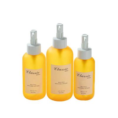 China Witte olie cosmetische fles 150 ml 200 ml 300 ml gouden schouder parfum olie fles Te koop