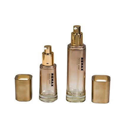 China 50g 40ml 100ml Gold-plated Lid Gradient Square Glass Material Lotion Bottle Cream Jar Skincare Set Packaging for sale