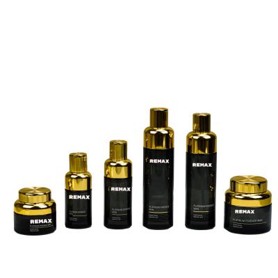 China 50g 100g 30ml 50ml 100ml 120ml Wiederauffüllbare Lotion Serum Behälter Goldplattiert Gewinde Deckel Schwarzes Glas Flaschenglas Set zu verkaufen