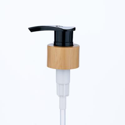 China 24/410 Black Wood Grain Water Transfer Printing Lotion Pump Is Used for Shower Gel and Moisturizer Bottles for sale