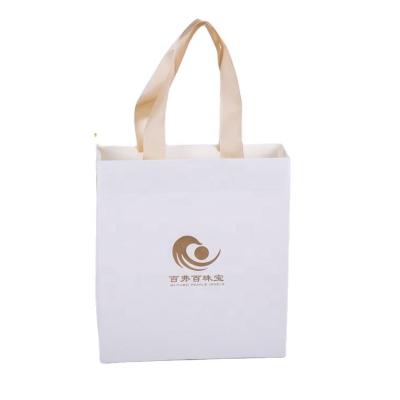 China Factory Direct Supply Recycled Materials New Arrivals Custom Logo Luxury Paper Gift Bags Clothing Packaging Paper Shopping Bags With Handles for sale