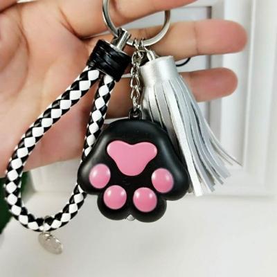 China Key Chain With Light Promotion Gifts Support Paw Tassel Key Chain With Led Light Animal Healthy Keyring for sale