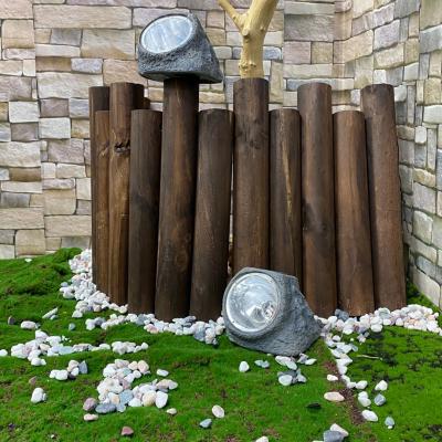 China Garden Factory Direct Supply Waterproof Large Resin Stone Lights Garden Lled Resin Solar Light Lamp for sale