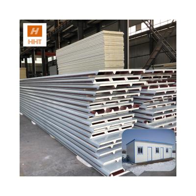 China 1150MM/960MM/950MM Low Price 16mm 20mm Metal Siding Panel PU Sandwich Panel Prefab House Wooden Vein For Light Steel Villa for sale