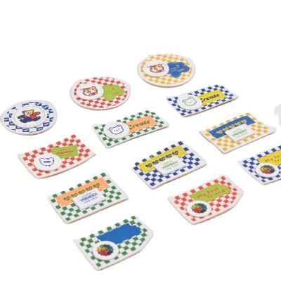 China Netting Washable Printed PU Leather Patches Cartoon Labels Sewing Garment Labels For Clothes Hat for sale