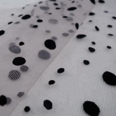 China Anti-Static Dobby Flock Black Dot Polyester Tulle Fabric For Lady Shirt Dress Fabric for sale